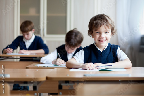 Diligent Student Sitting At Desk Clroom This Stock Photo Diligent Student Sitting At Desk Clroom