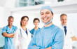 © Minerva Studio - Smiling doctor in front of his team