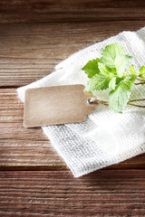 Poster - Tag on rustic wooden table with burlap