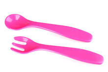 Pink Fork And Spoon For Baby Food Isolated On White