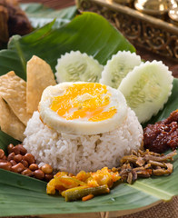 Wall Mural - nasi lemak , malay traditional rice meal served with egg