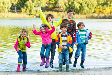 Wall Mural - Kids in rubber boots