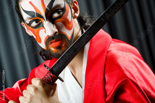 Naklejka na drzwi Man with sword and face mask