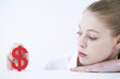 © mnimage - Businesswoman with dollar sign
