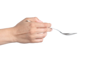 Woman hand using a spoon