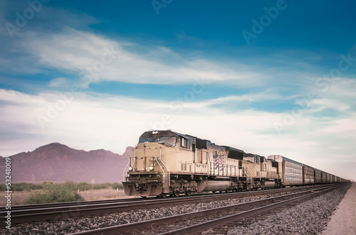 Obraz w ramie Freight train in Arizona desert landscape