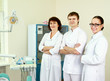 © shefkate - A medical doctors standing in dentist office