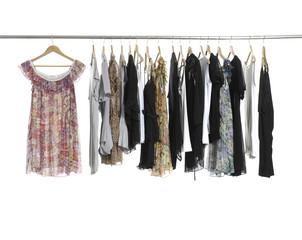 Variety of casual fashion clothing on hangers
