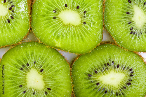 Naklejka dekoracyjna Many slices of kiwi fruit