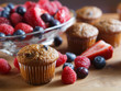 Assortment of fresh bran muffins and colorful berries