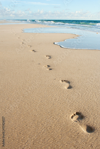 Human footprints on the beach sand Poster Mural XXL