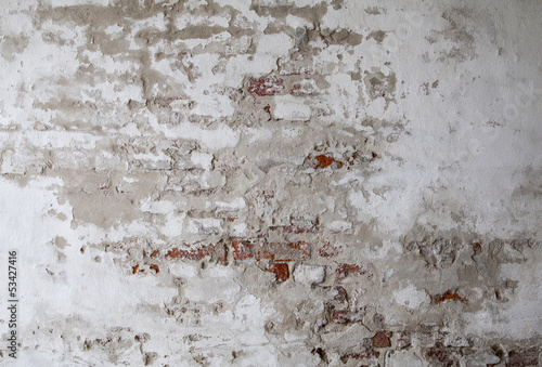 stary-mur-z-czerwonej-cegly-z-popekanego-betonu