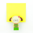 yellow note pad with sheep clip