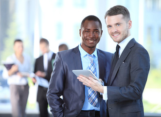 Two business men working together in the office