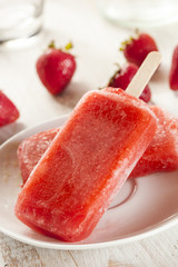 Wall Mural - Cold Organic Frozen Strawberry Fruit Popsicle