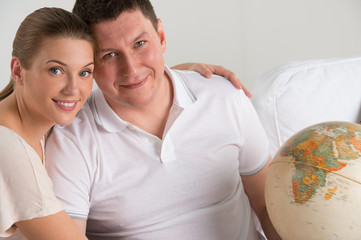 Wall Mural - Portrait of happy romantic couple planning their vacation