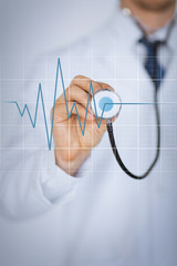 Wall Mural - doctor hand with stethoscope listening heart beat