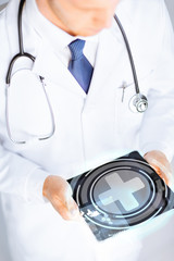 Sticker - male doctor holding tablet pc with medical app