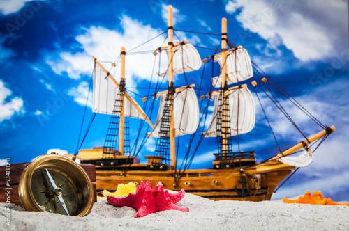 Fototapeta na wymiar Beach and sea concept with white sand and blue sky