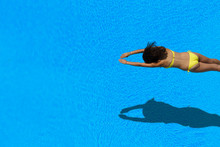 Girl Diving In The Swimming Pool