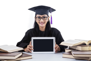 An isolated shot of female graduate show blank touchpad