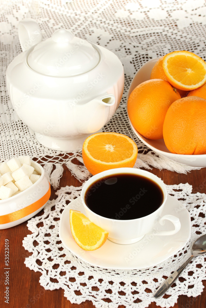 Beautiful white dinner service with oranges