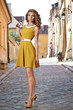 © ZoomTeam - Young fashion woman in old city