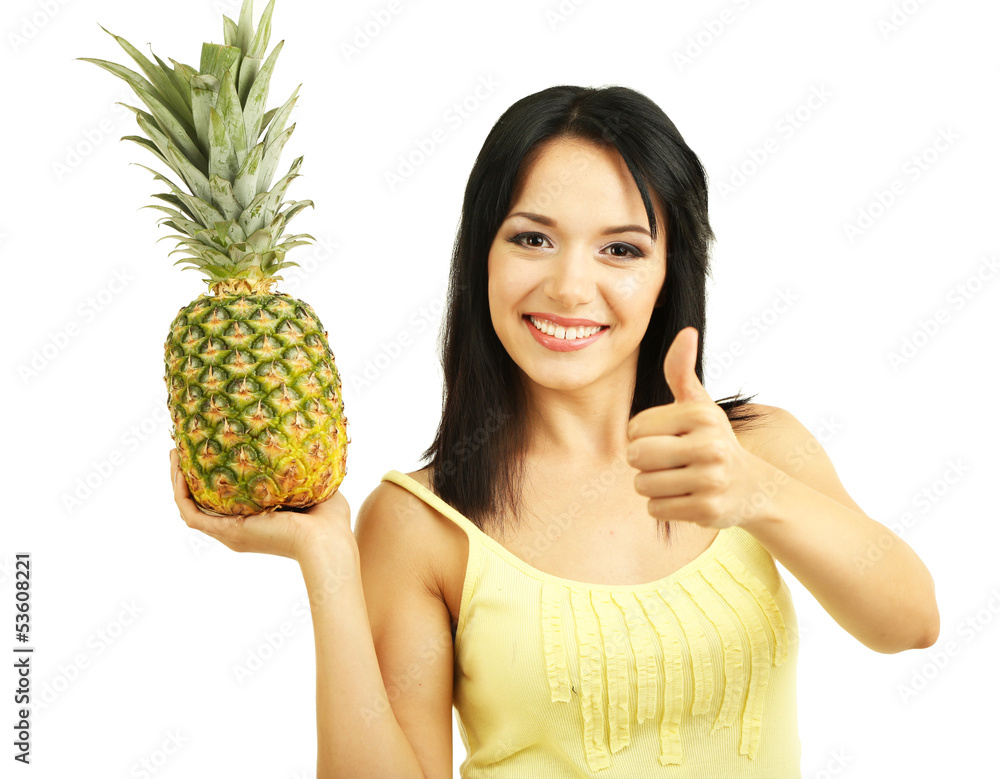 Girl with fresh pineapple isolated on white