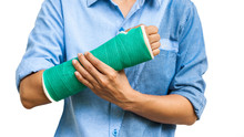 Green Cast On An Arm Of A Women Isolated
