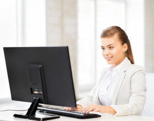 Canvas Print - businesswoman with computer in office