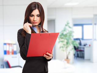 Poster - Businesswoman reading a document