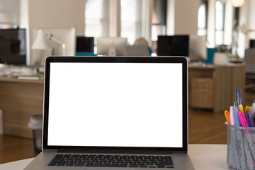 Laptop pc on the table in office.