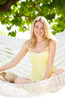 © Monkey Business - Woman Relaxing In Beach Hammock