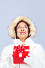 Poster - Beautiful christmas girl with gifts.