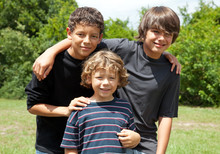 Portrait Of Three Boys Smiling