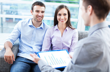 Wall Mural - Couple meeting with financial adviser