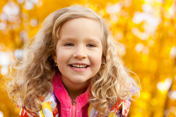 Sticker - Happy girl in autumn park