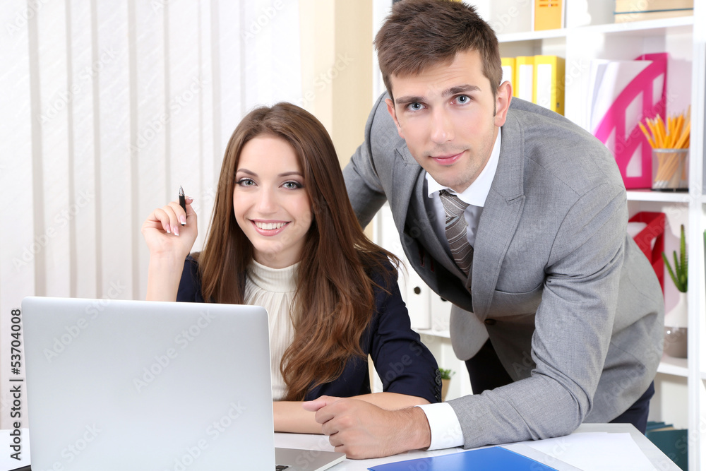 Business colleagues working together in office