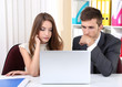 © Africa Studio - Business colleagues working together in office