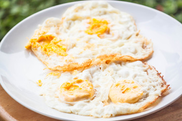 Double serving of star eggs on white plate