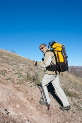 Wall Mural - Hiker is climbing mountain in the Crimea mountains