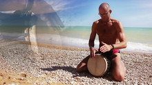 Djembe Drum Player Beat Rythm On The Beach With Close Up Hands
