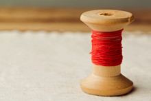 Close Up Of Vintage Red Thread