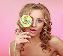 Young Happy Woman With Lollipop, Isolated On Pink Background