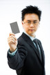 © vichie81 - Businessman holding business name card