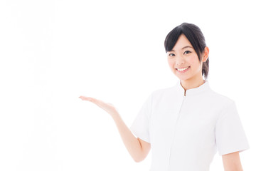 Wall Mural - attractive asian nurse showing on white background