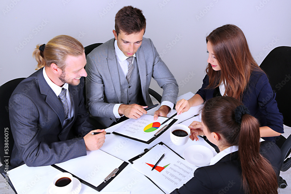 Group of business people having meeting together