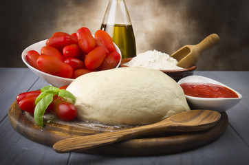 tomato basil flour olive oil for homemade pizza 