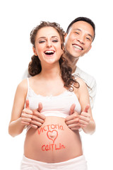 Wall Mural - Pregnant woman with her husband.