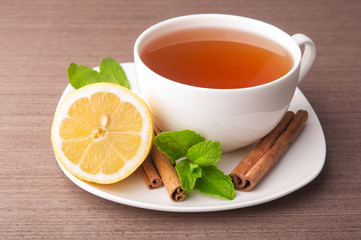 Wall Mural - Cup of tea with lemon and mint